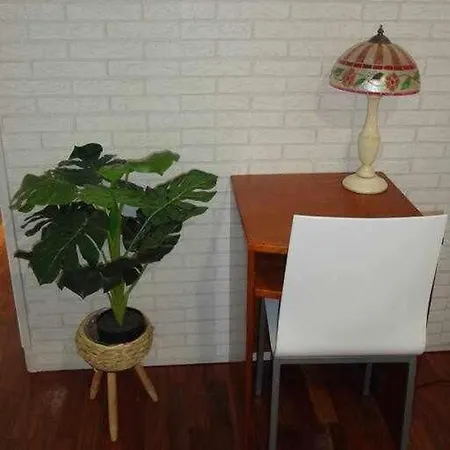Acogedora En *