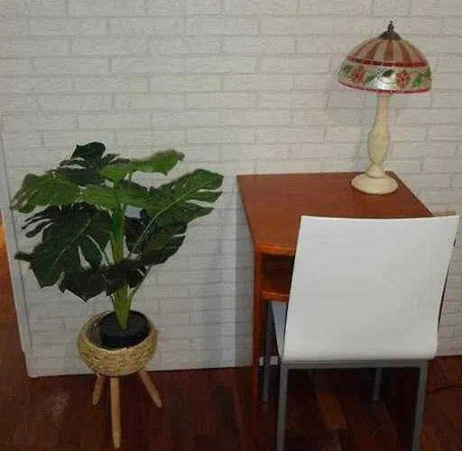 Acogedora En *