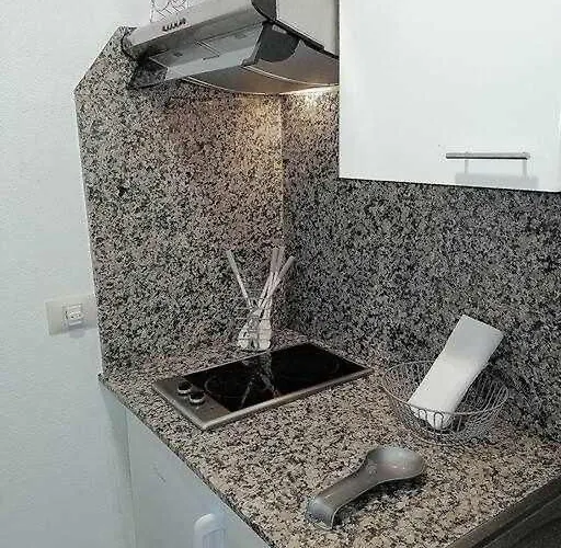 Acogedora En *